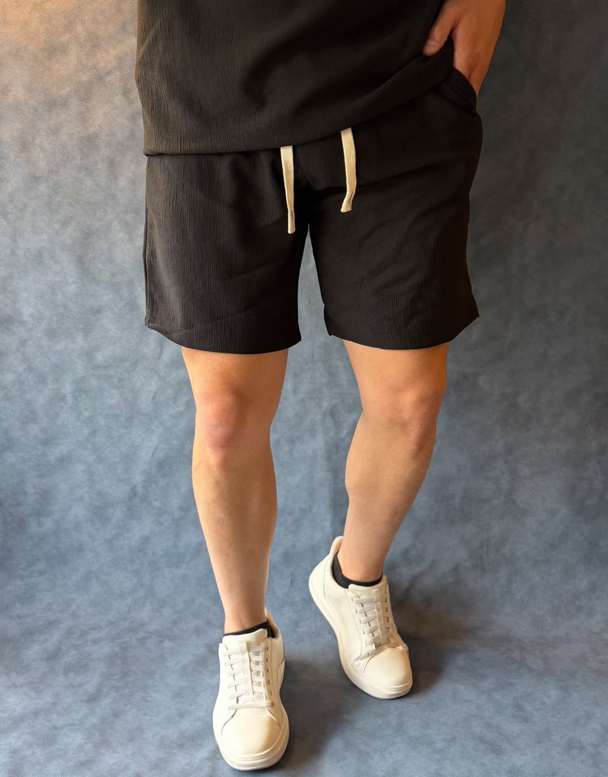 Conjunto Creed negro trufa detalle